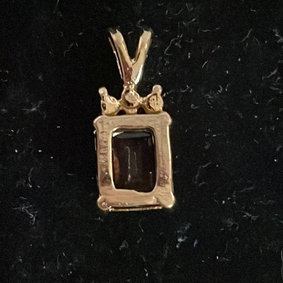 0.75” gold tone pendant with prong set amethyst color gem & 3 bezel set crystals - Picture 9 of 14